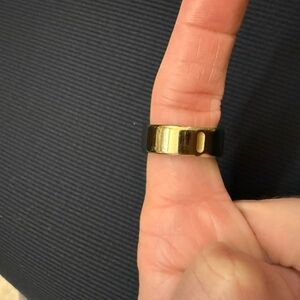 Oura Black and Gold Ring